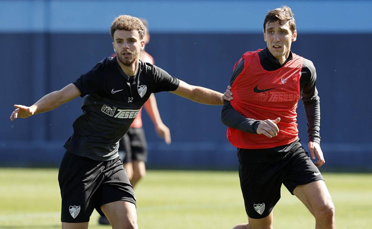 Quintana y Scepovic, que puede tener hoy sus primeros minutos, en un entrenamiento. 