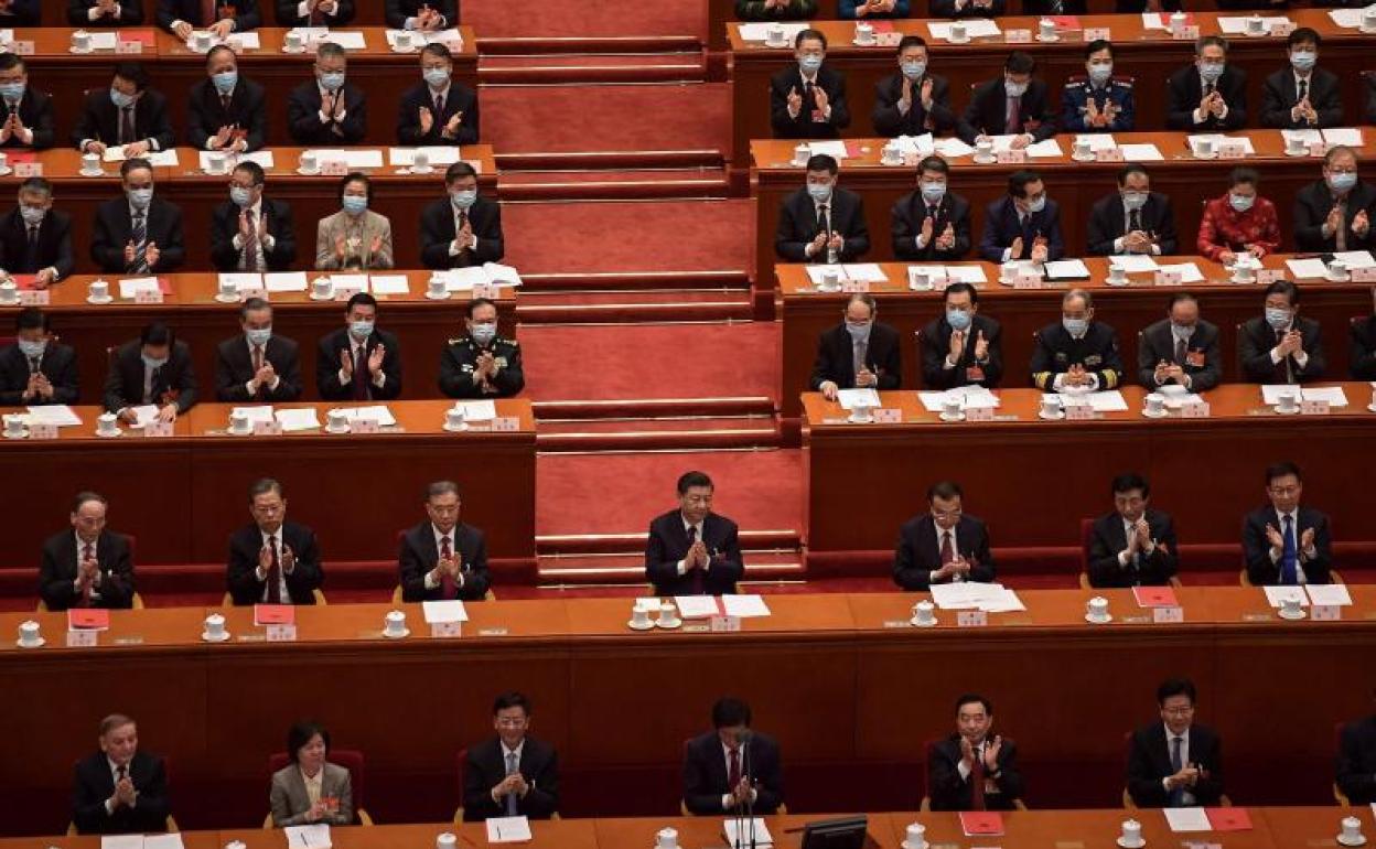 Xi Jinping, en el centro. 