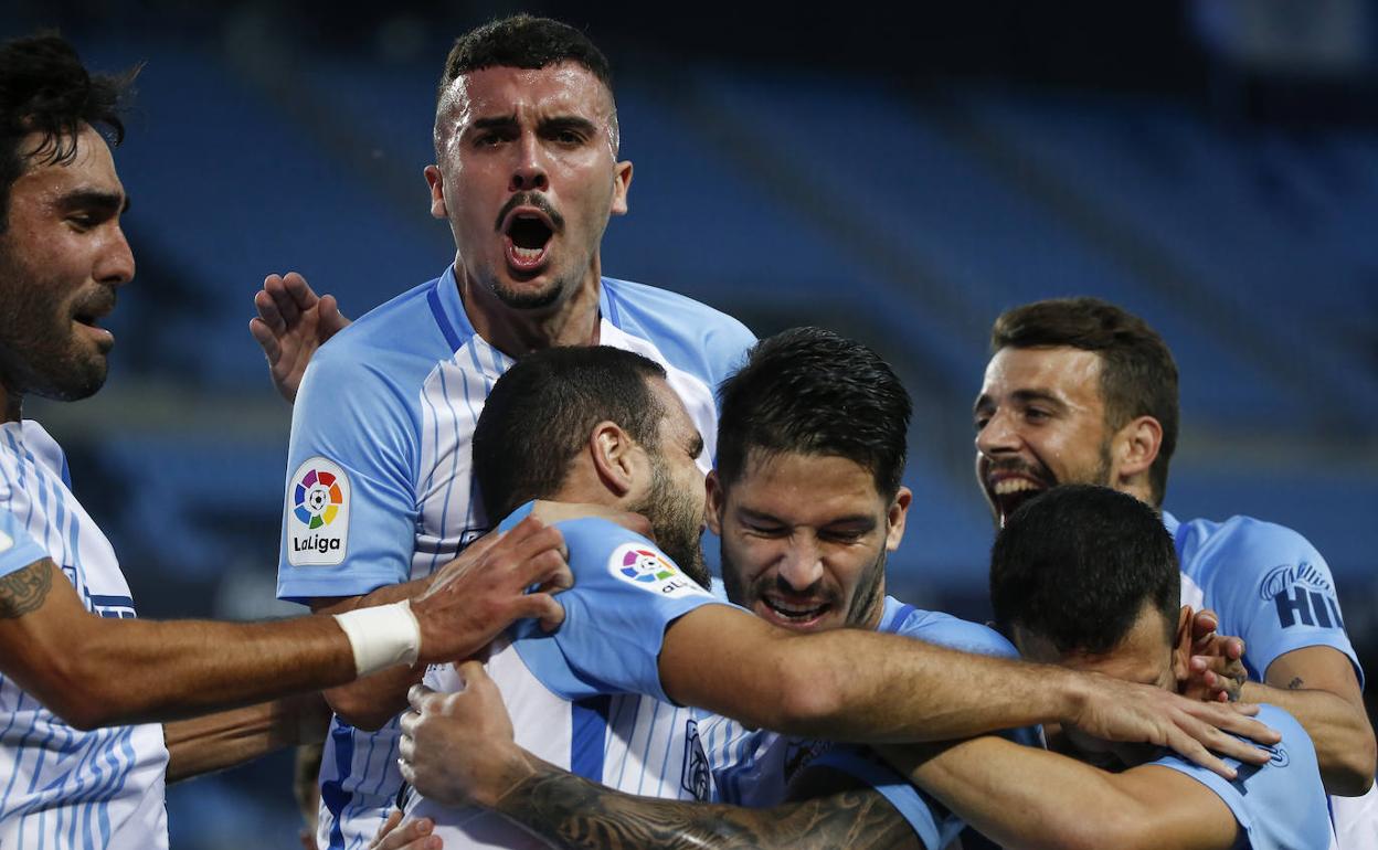 La celebración del gol malaguista del sábado, con Escassi, Joaquín, Lombán, Caye Quintana y Cristian. 