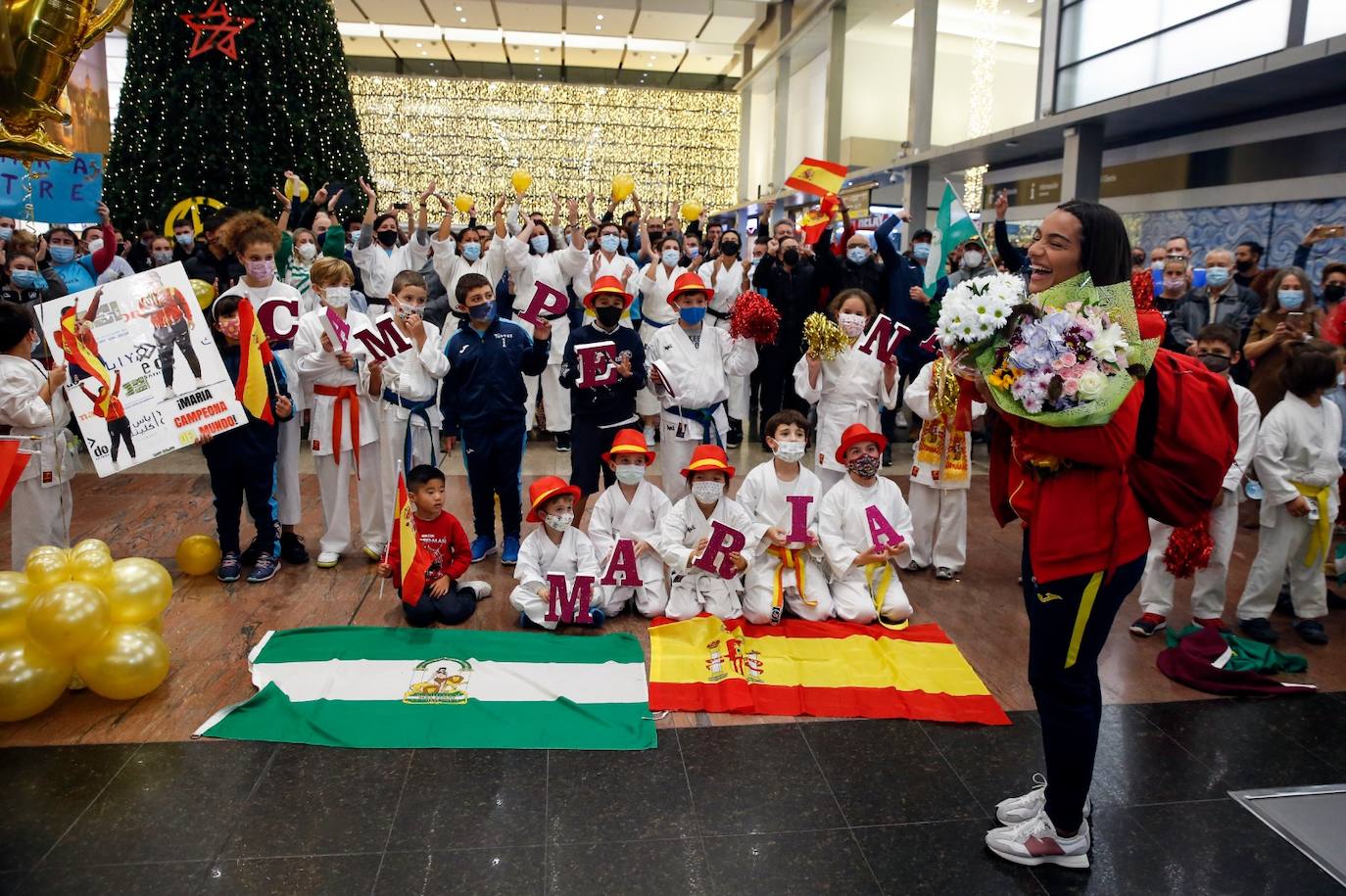 Recibimiento en su vuelta a casa a la campeona mundial María Torres. 