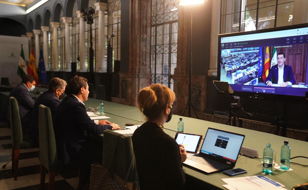 El presidente andaluz, Juanma Moreno, en su intervención telemática en el Comité Europeo de las Regiones. 