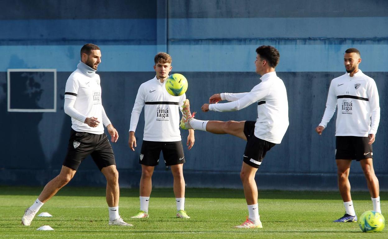 Lombán, Dani Lorenzo, Andrés e Hicham, durante el entrenamiento de ayer. 