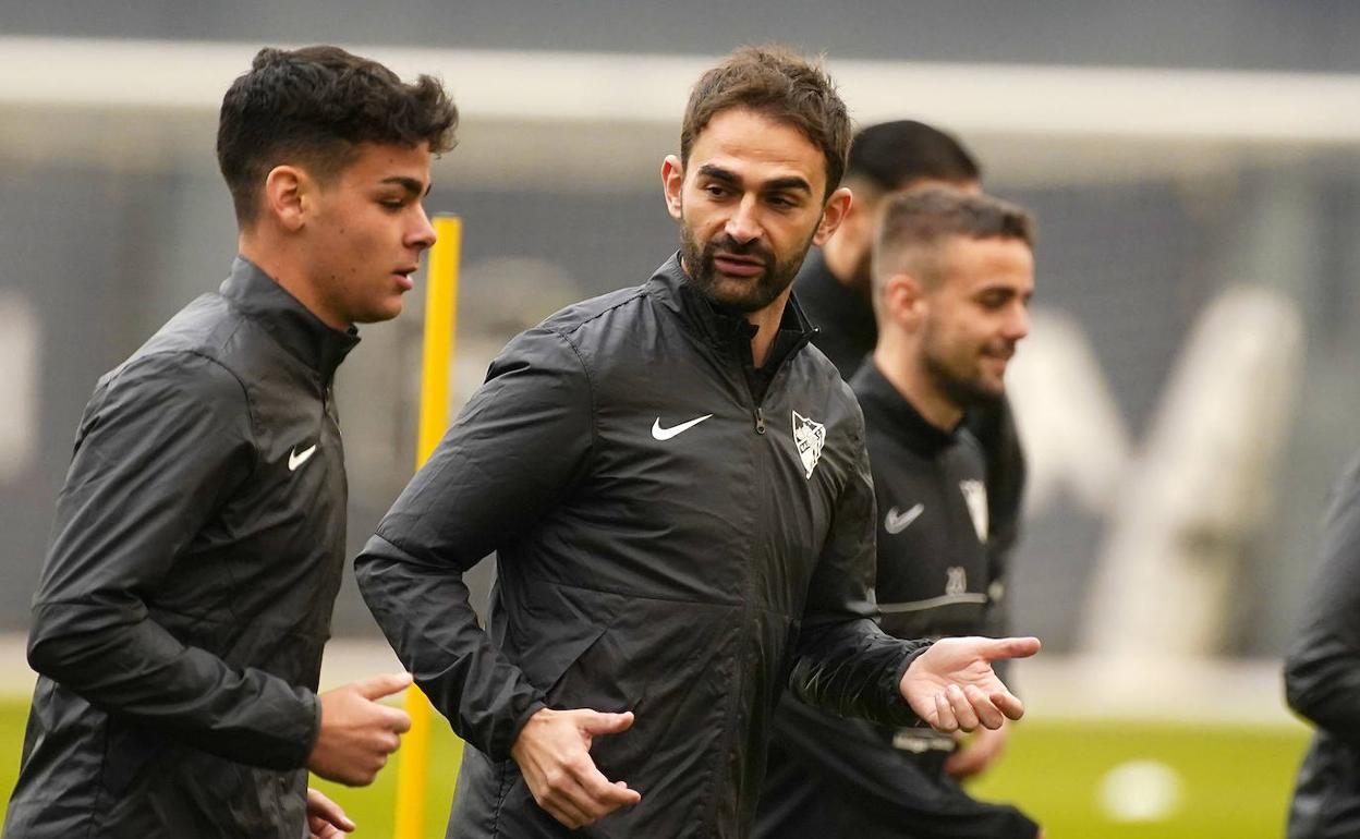 Adrián, con Andrés, en el entrenamiento de este martes. 