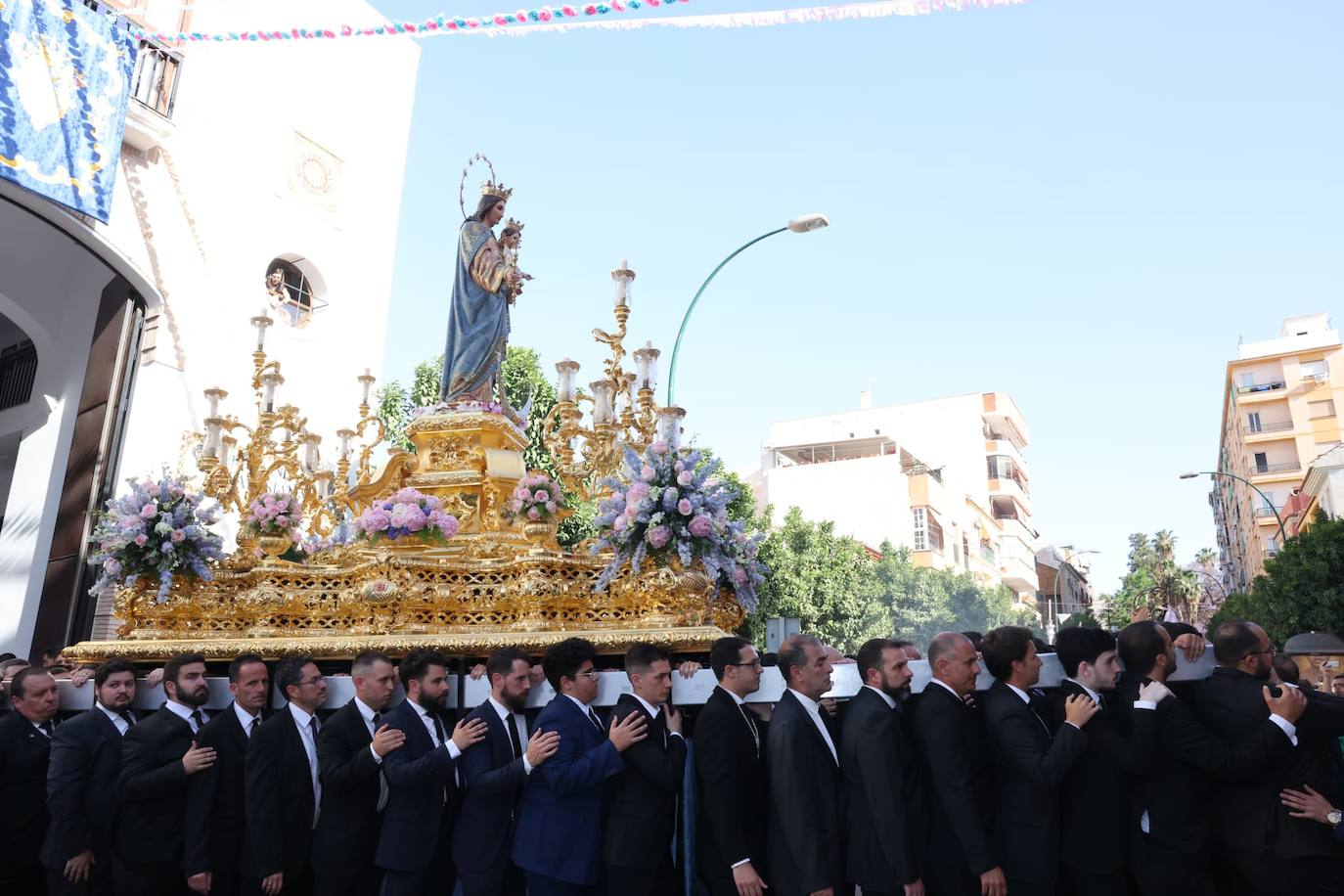 Procesión de María Auxiliadora por las calles de Málaga. 