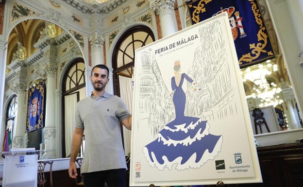 Rubén Roldán posa con el cartel que ha dibujado. 