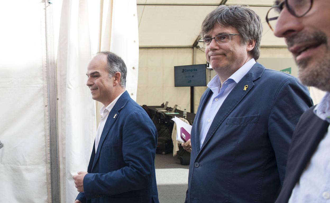 Jordi Turull y Carles Puigdemont, en el congreso de Junts de junio.