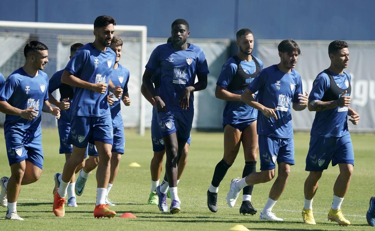 Ramón, Juande, N'Diaye, Jozabed y Rubén Castro, en primera fila durante la carrera continua del entrenamiento del miércoles. 