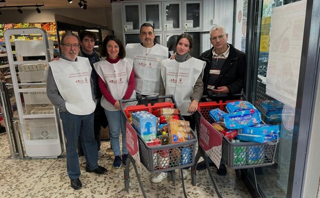 Voluntarios de la Cofradía de El Rico. 