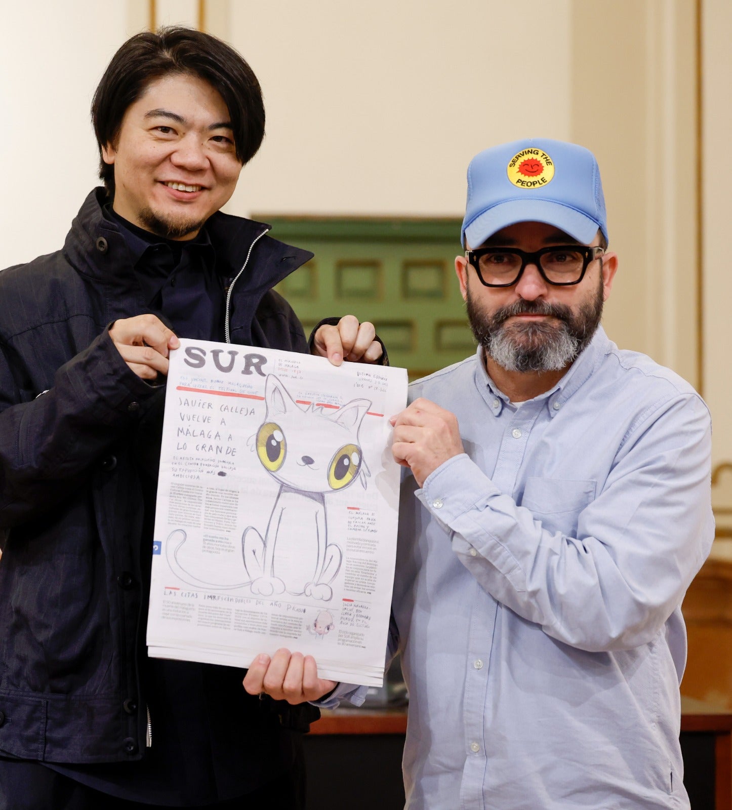 Shinji Nanzuka, representante de la obra de Calleja en Asia, y el artista con la portada realizada para SUR.