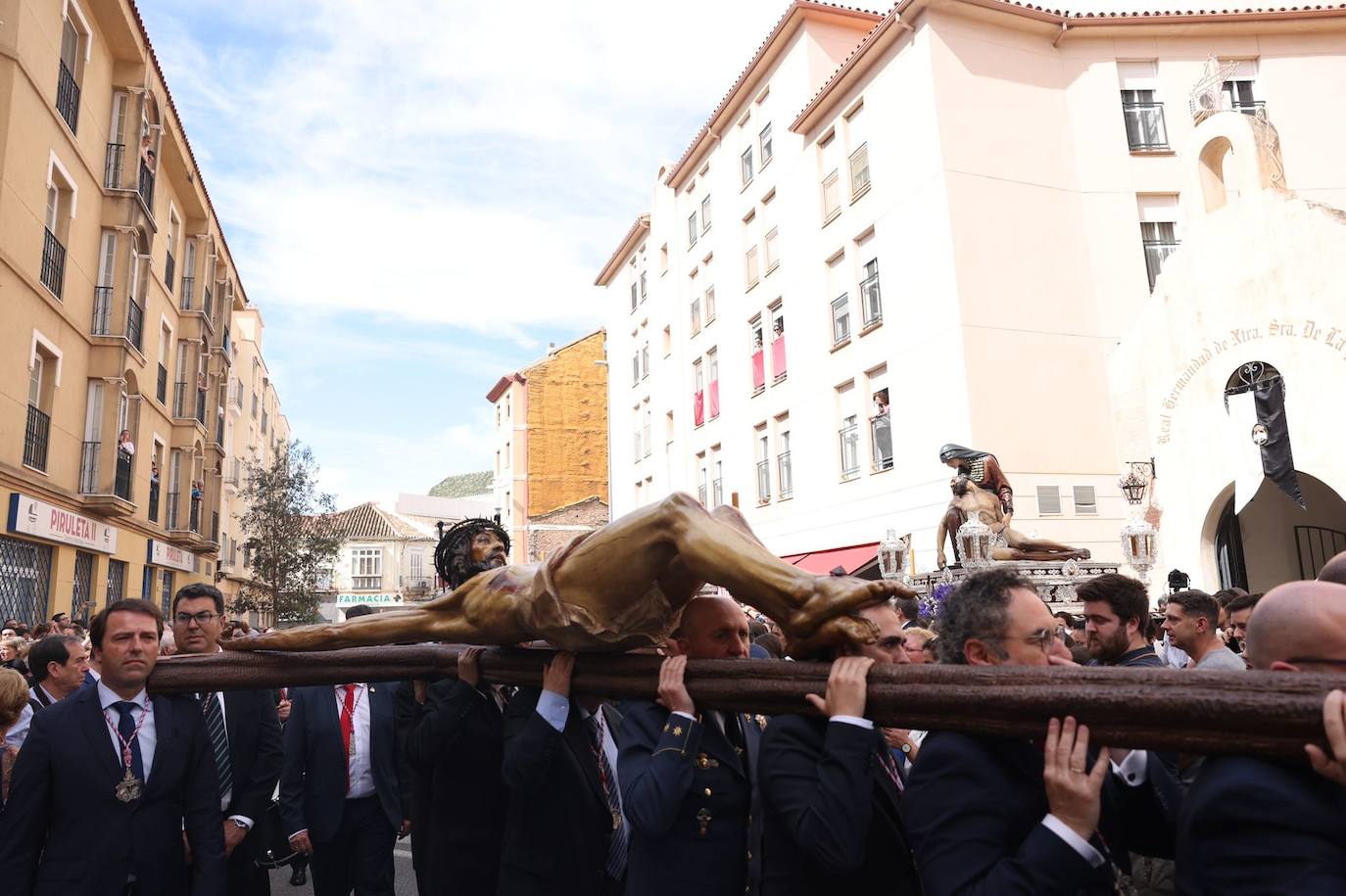 Traslado de los titulares de la Archicofradía de la Sangre desde la parroquia de San Felipe Neri a la casa hermandad, este domingo 26 de marzo