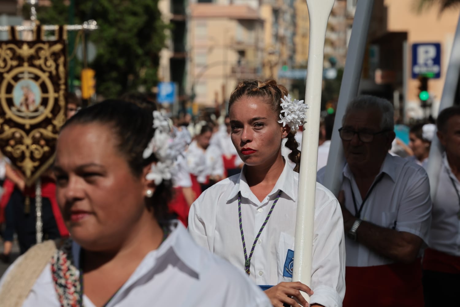 La Virgen del Carmen ha recorrido este domingo las calles del barrio de El Palo