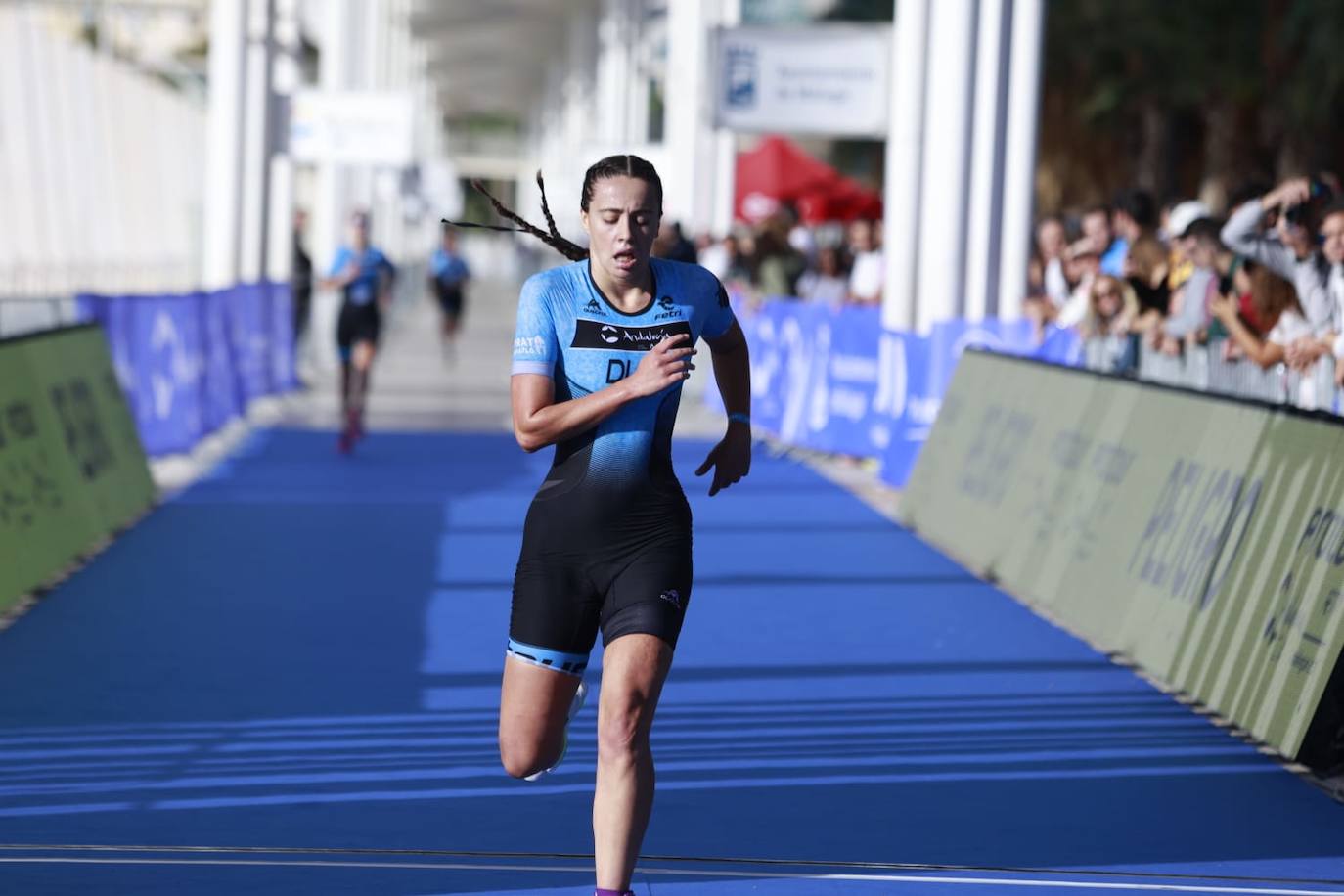 Las mejores imágenes de la primera gran prueba de triatlón de la historia en Málaga