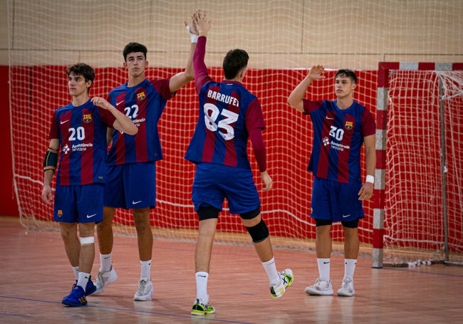 Manuel Ortega, a la izquierda de la imagen, en un partido con el Barcelona B.