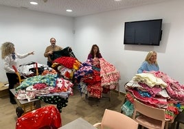 Inventario de los vestidos y prendas donados para ser enviados a Nueva Iberia.