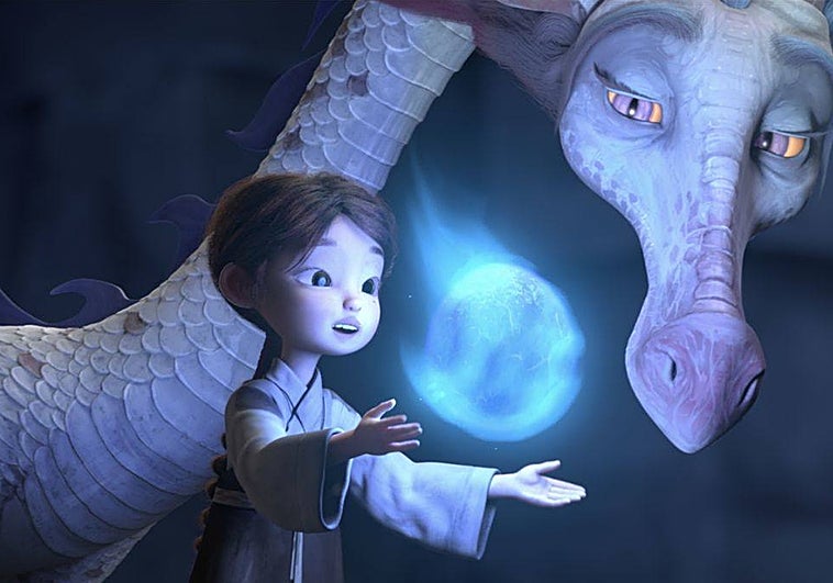 Ping, la protagonista del filme junto a uno de los dragones.