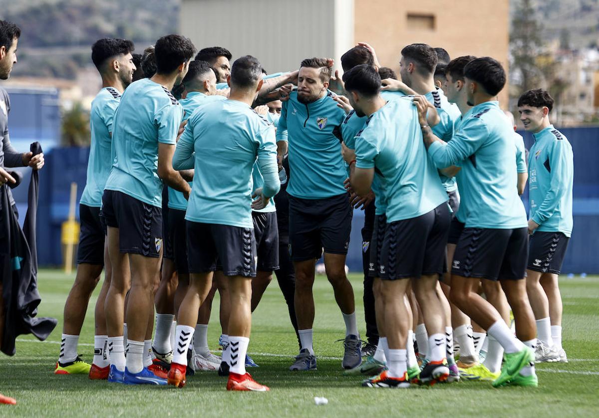 Genaro junto al resto de jugadores del Málaga.