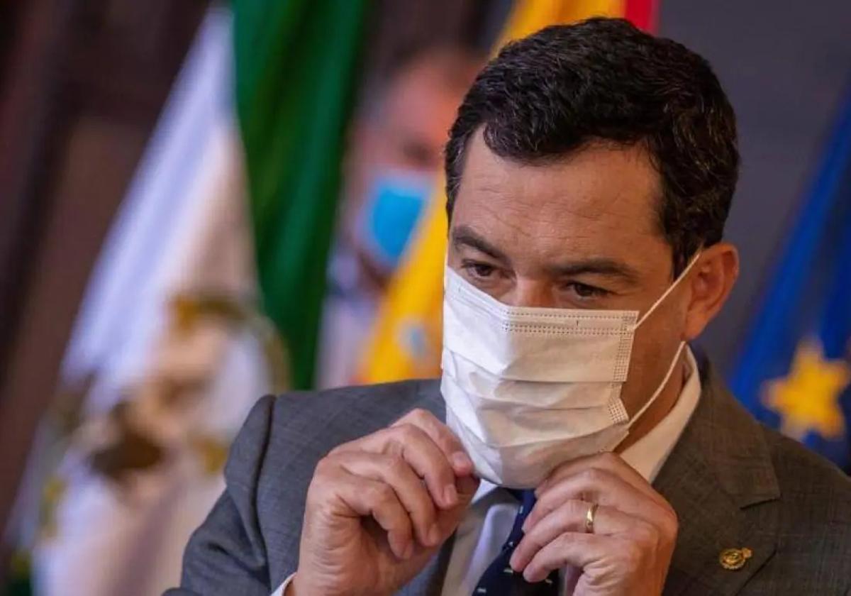 El presidente de la Junta, con mascarilla, en una imagen de archivo.