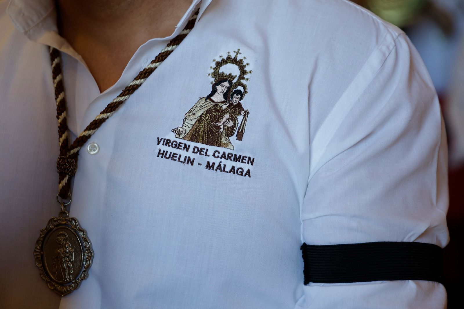 La procesión de la Virgen del Carmen de Huelin, en imágenes