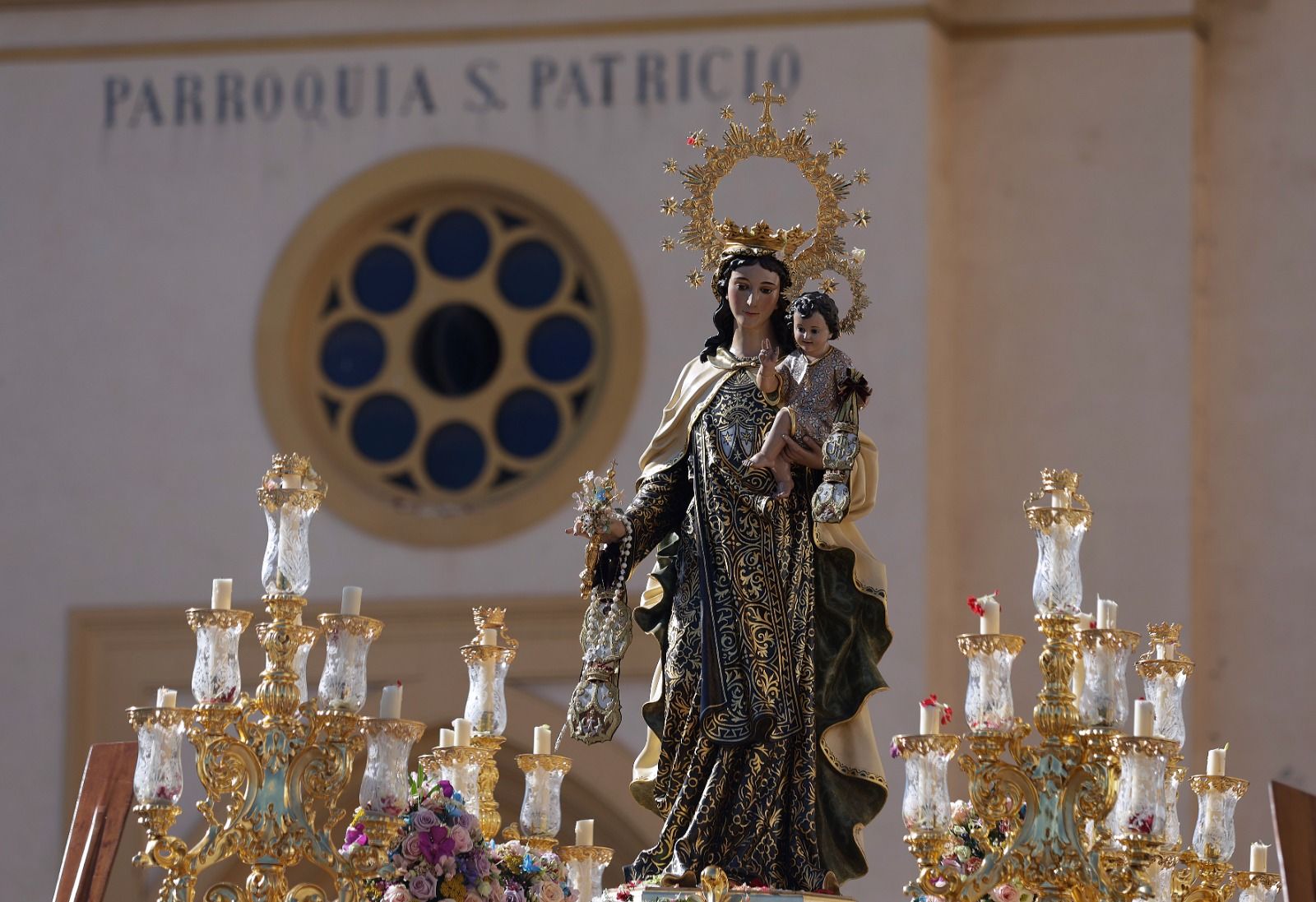 La procesión de la Virgen del Carmen de Huelin, en imágenes