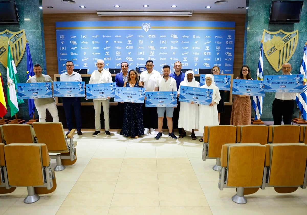 Los representantes de las asociaciones, en la sala de prensa de La Rosaleda.