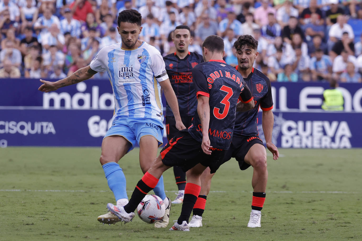 El Málaga-Huesca, en imágenes