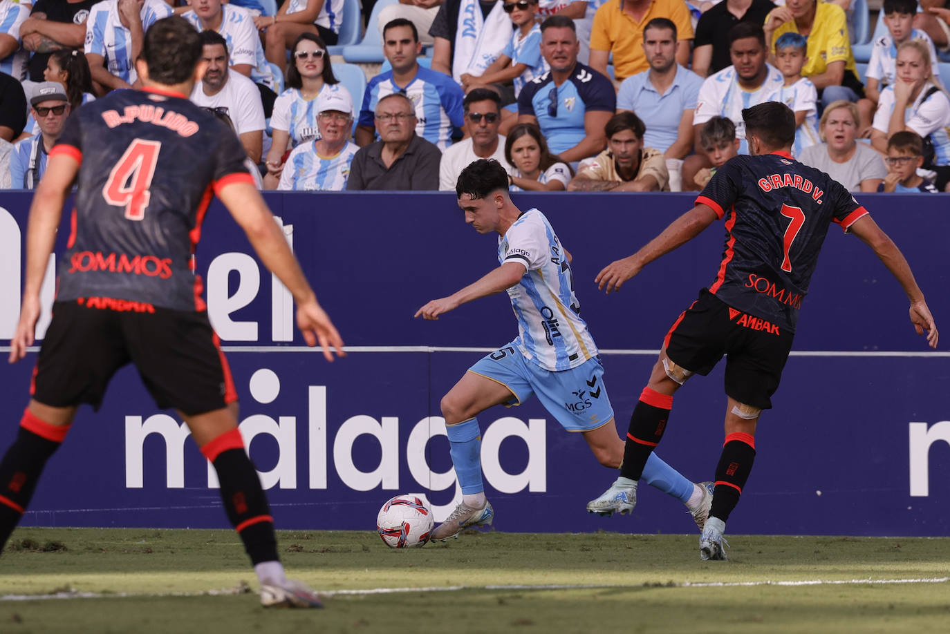 El Málaga-Huesca, en imágenes