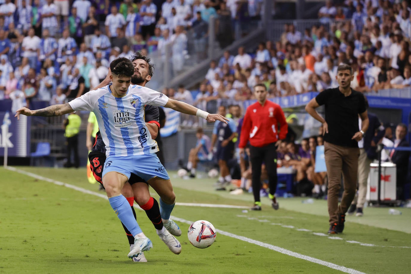 El Málaga-Huesca, en imágenes