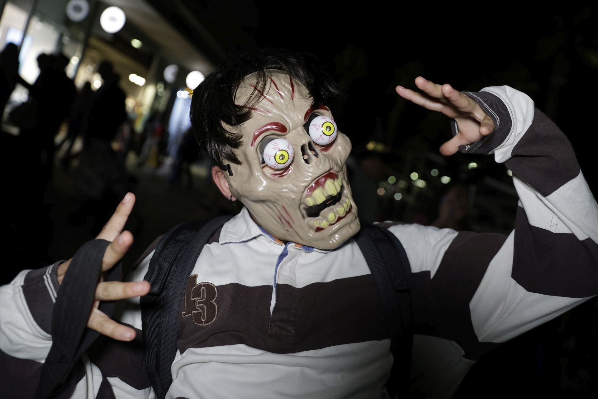 Las imágenes de un Halloween a medias en Málaga