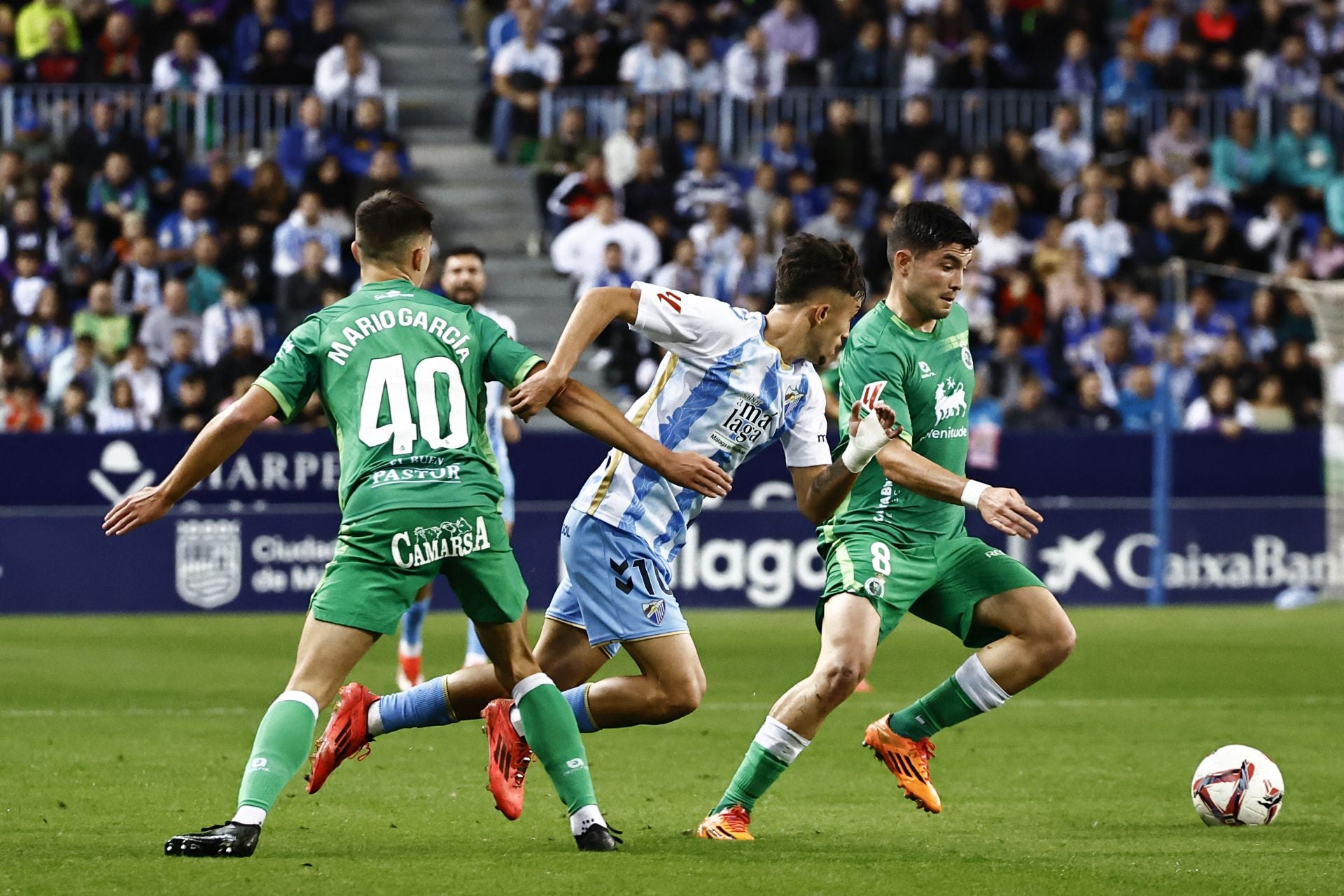 El Málaga - Racing, en imágenes