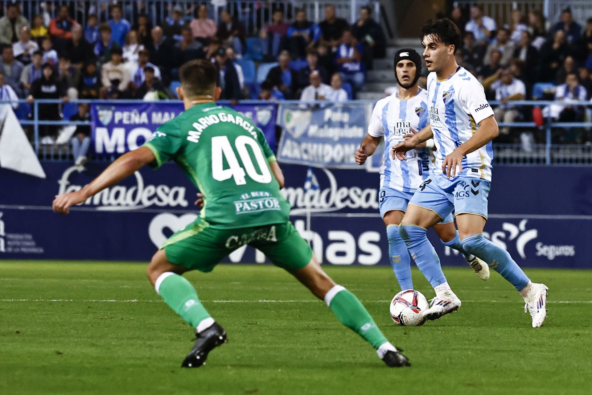 El Málaga - Racing, en imágenes