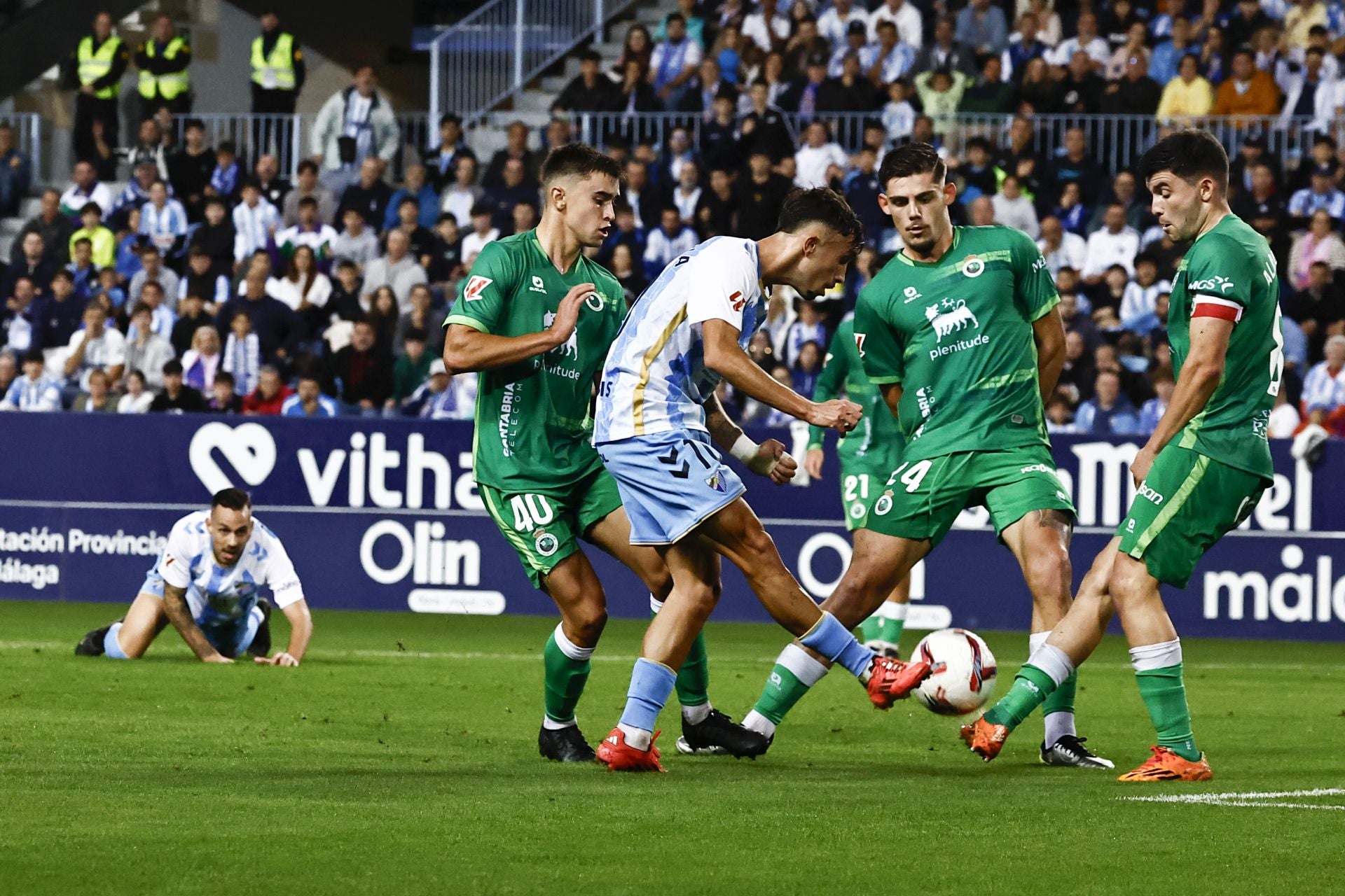 El Málaga - Racing, en imágenes