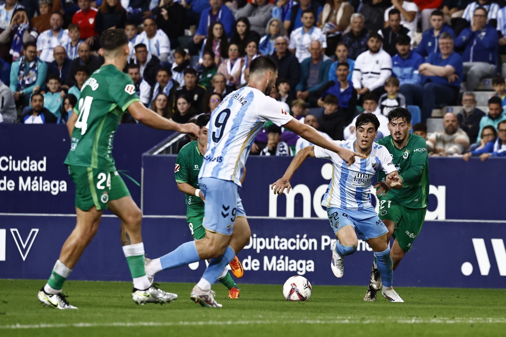 El Málaga - Racing, en imágenes