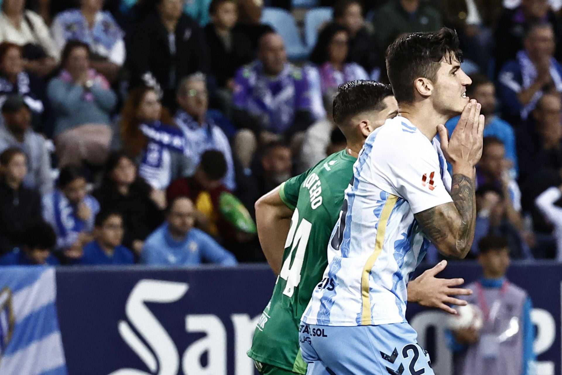 El Málaga - Racing, en imágenes