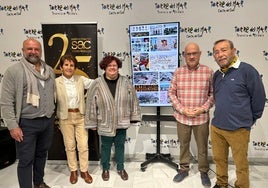 Acto de presentación del calendario conmemorativo de la SAC en Torre del Mar, este jueves.