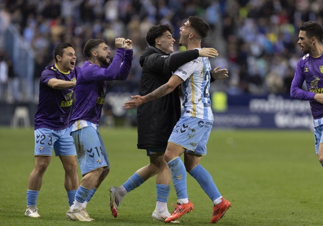 Chupete celebra con Lobete su gol con el primer equipo al Deportivo.