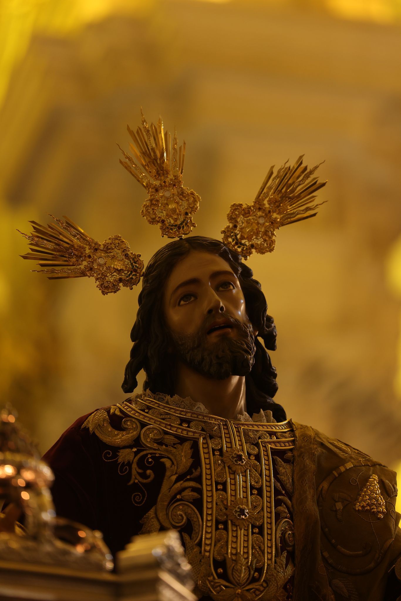 El vía crucis de la Agrupación de Cofradías de Málaga, en imágenes