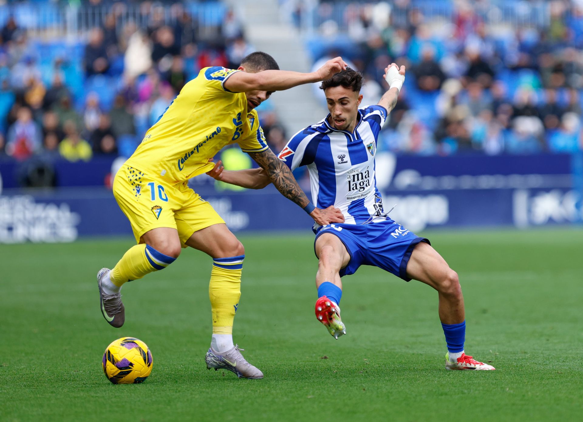 El Málaga - Cádiz, en imágenes