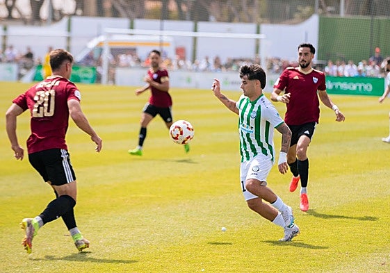 Imagen del partido entre el Torremolinos y La Unión.