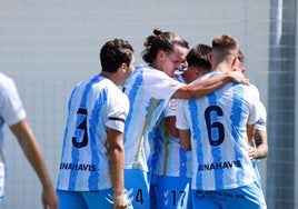 Los jugadores del Malagueño celebran un gol.