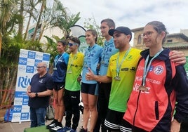 Los podios masculino y femenino de la Media Maratón de Vélez-Málaga.