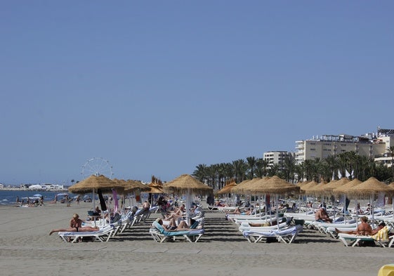 Turistas, en Torremolinos.