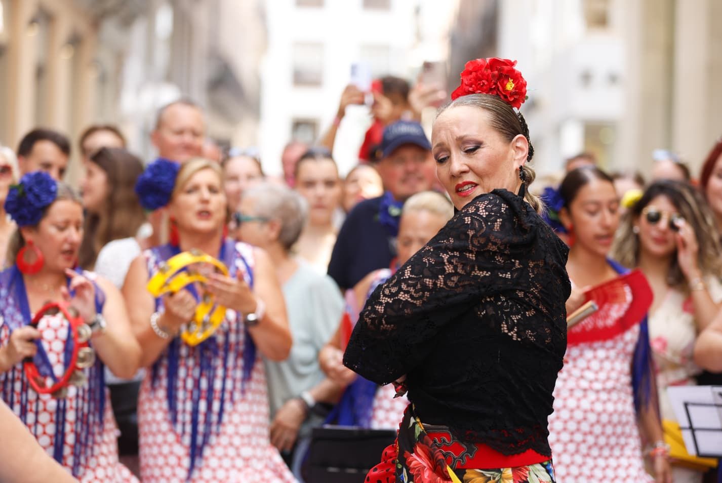 Ambiente de la última jornada de feria de Málaga en el Centro Histórico.