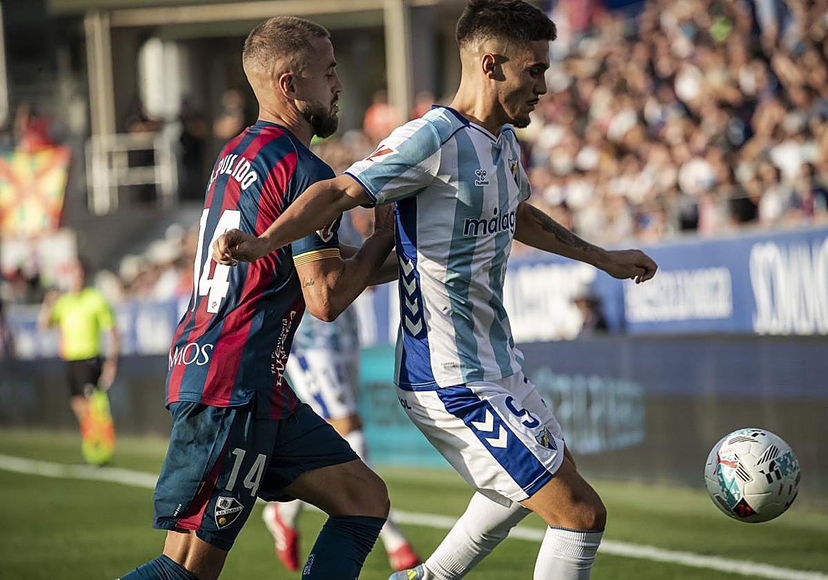 El Huesca- Málaga, en imágenes