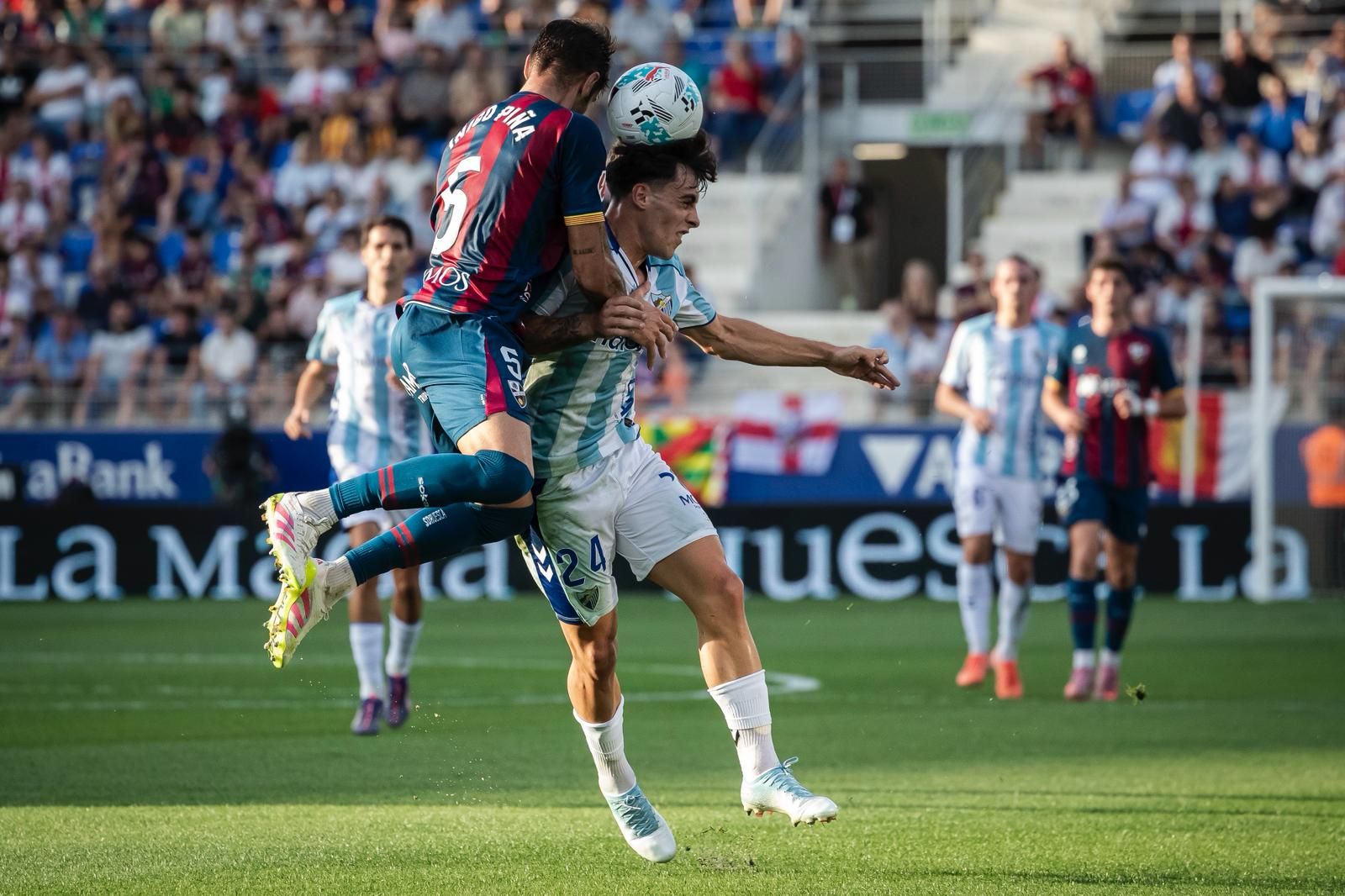 El Huesca- Málaga, en imágenes
