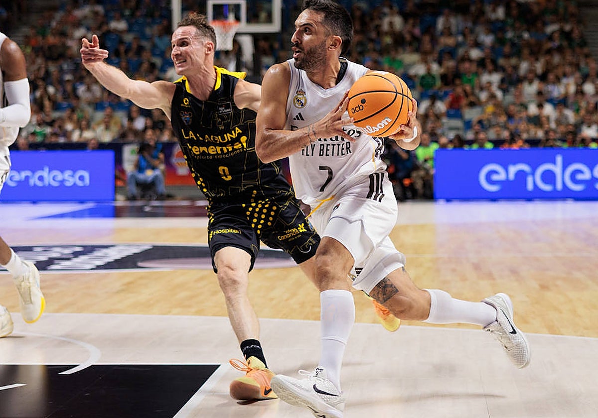 Campazzo avanza ante Huertas.