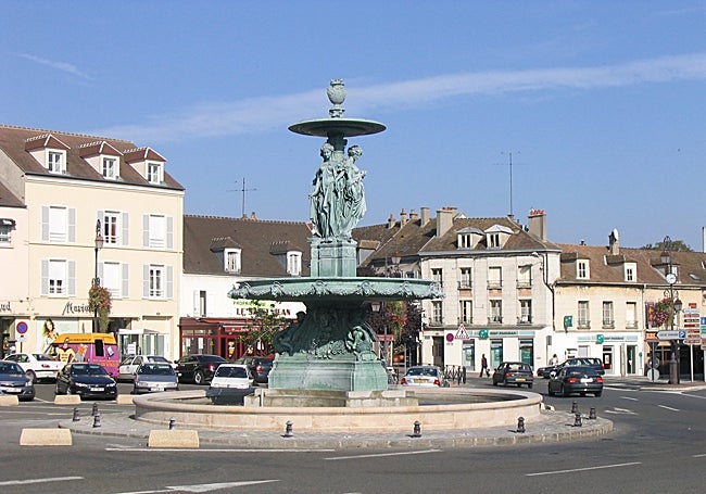 En la imagen de arriba, la fuente 'gemela' de los Tres Ríos, en la localidad francesa de Melum. Abajo, la fuente de las Tres Gracias a principios del siglo XX en el Parque