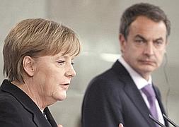 Merkel considera que los «grandes logros de España han permitido un rumbo más positivo» de la economía