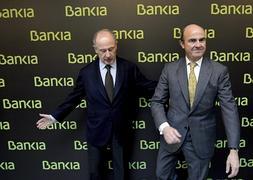 Luis de Guindos, junto a Rodrigo Rato. / Foto: Archivo | Vídeo: Atlas