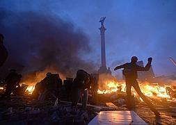 Disturbios registrados el pasado mes de febrero en el Maidán. / Sergei Supinsky (Afp)