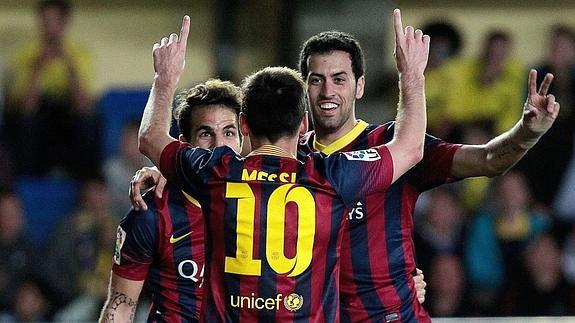 Messi celebra un gol con sus compañeros. 